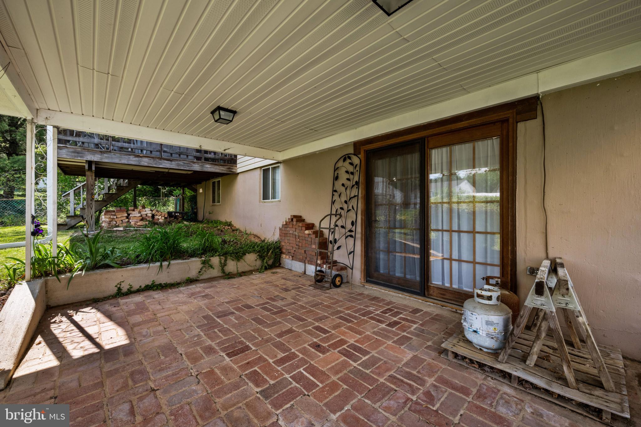 245 Candytuft Road Reisterstown, MD 21136 - Photo 33 of 40 Covered patio with brick