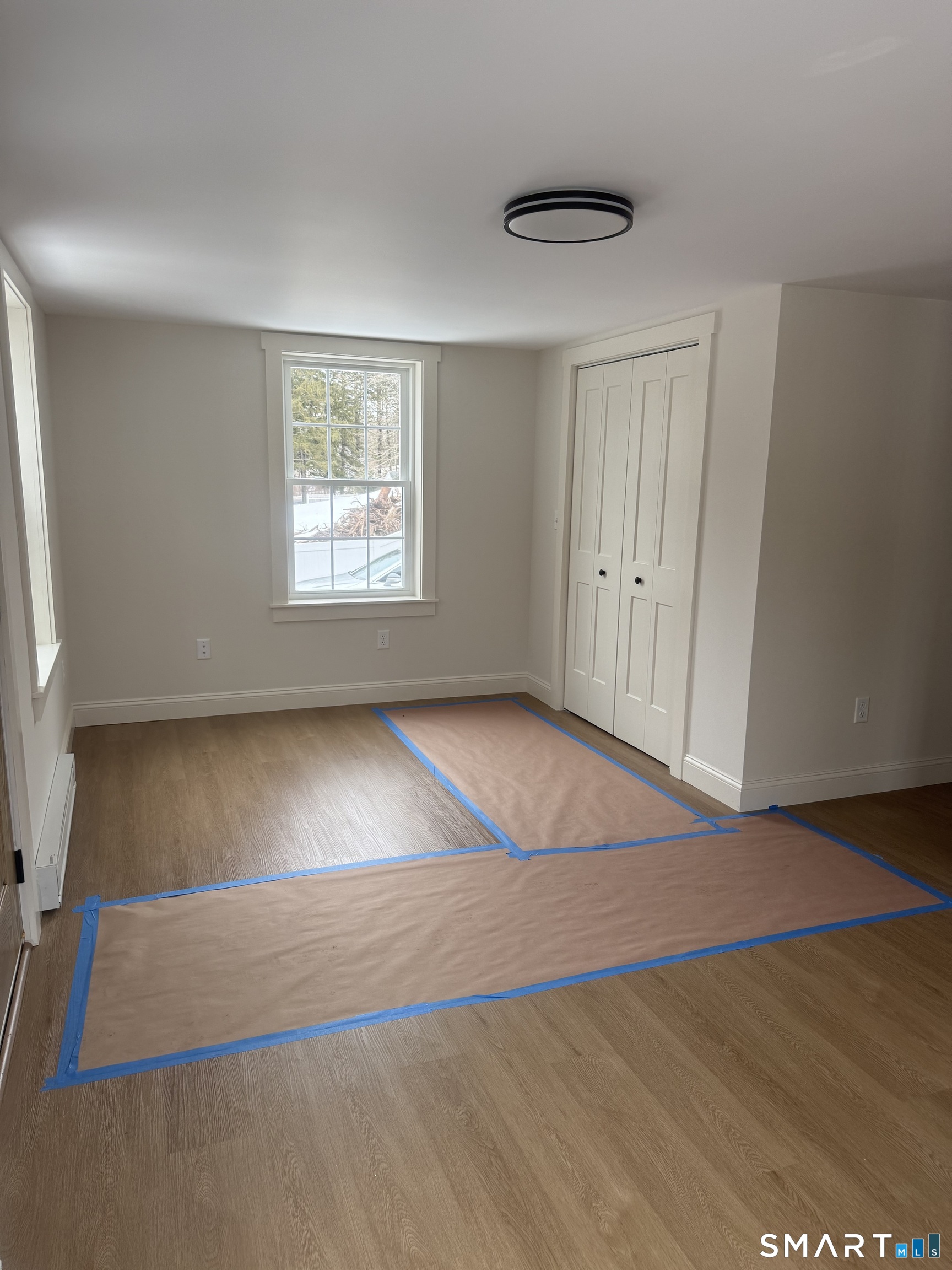 2 Mixville Road Prospect, CT 06410 - Photo 11 of 22 an empty room with wooden floor and windows