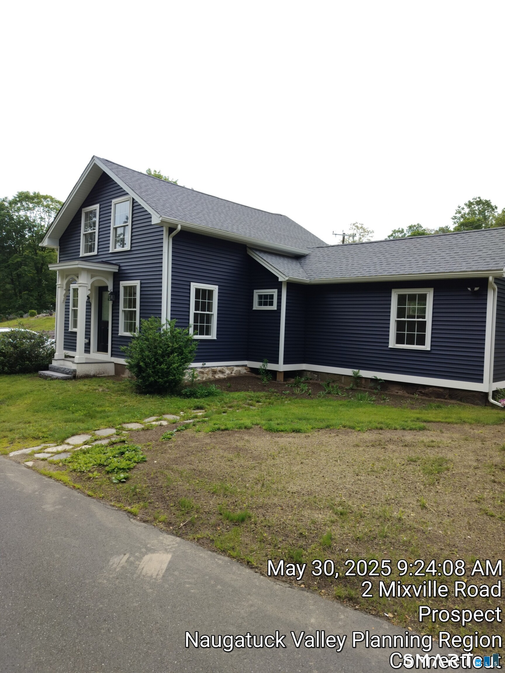 2 Mixville Road Prospect, CT 06410 - Photo 3 of 22 a front view of a house with a yard