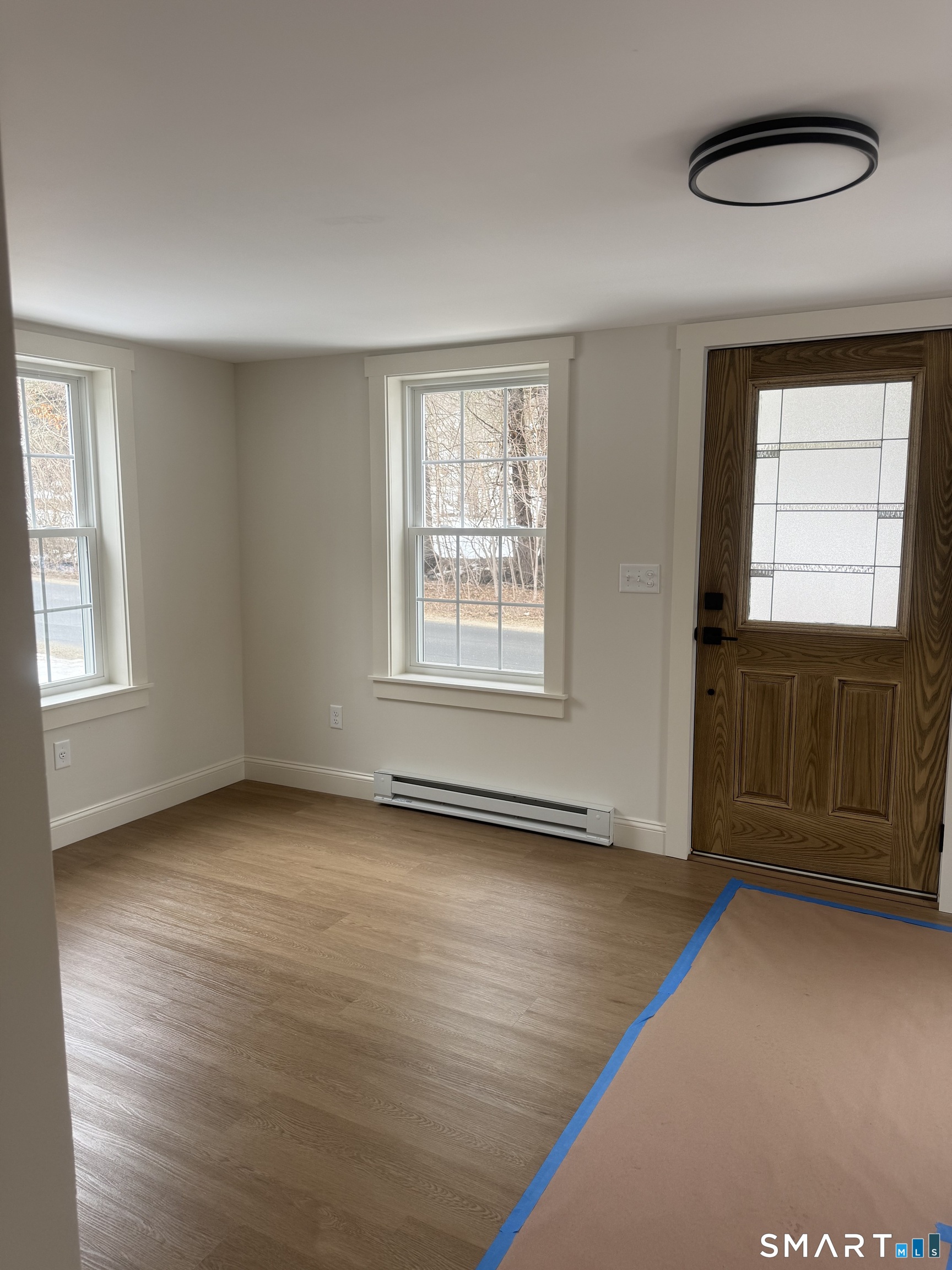 2 Mixville Road Prospect, CT 06410 - Photo 10 of 22 an empty room with wooden floor and windows