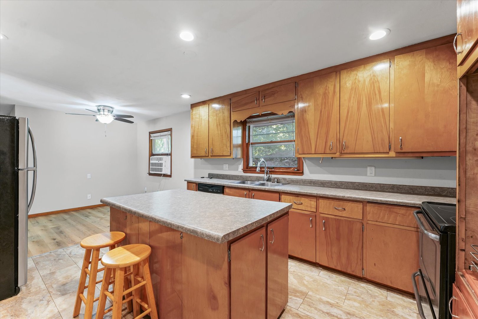 1507 West Columbia Avenue Champaign, IL 61821 - Photo 12 of 28 a kitchen with a sink cabinets and window