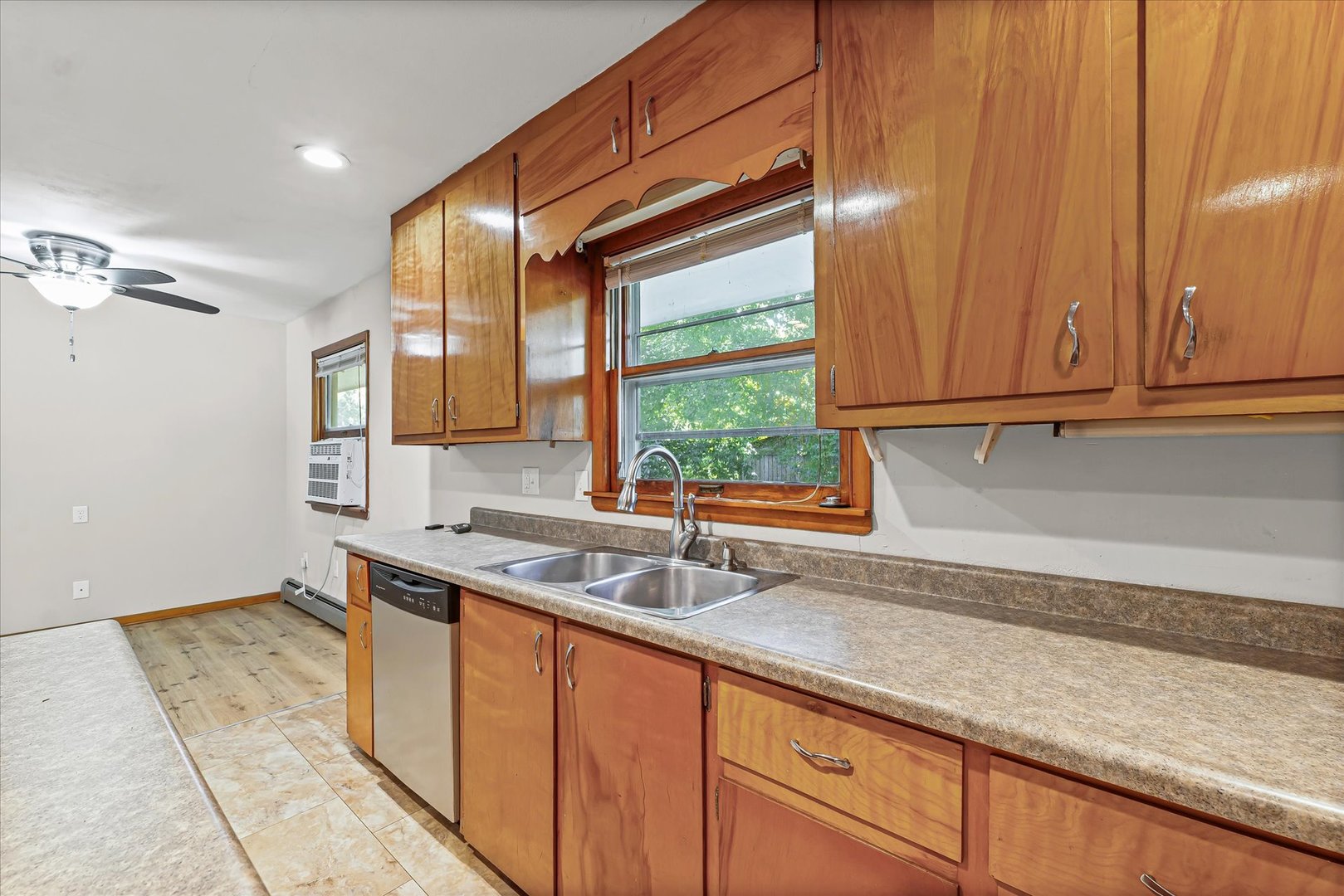 1507 West Columbia Avenue Champaign, IL 61821 - Photo 14 of 28 a kitchen with a sink and cabinets