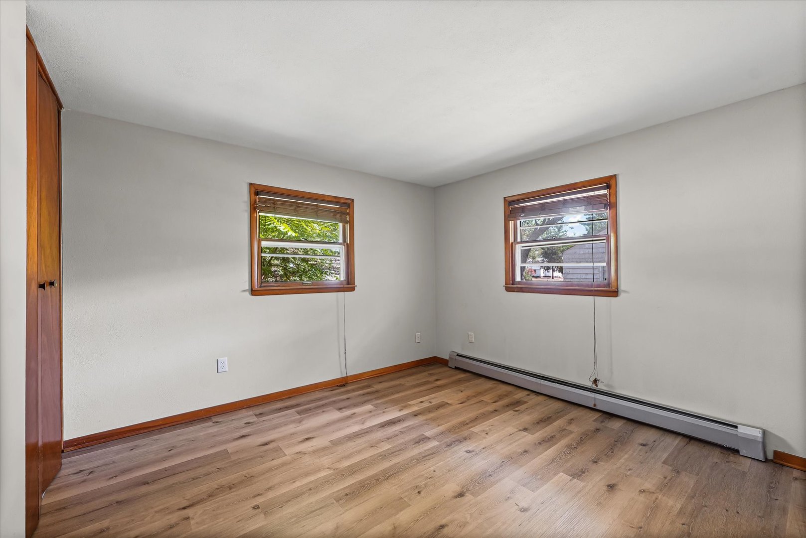 1507 West Columbia Avenue Champaign, IL 61821 - Photo 15 of 28 a view of empty room with wooden floor