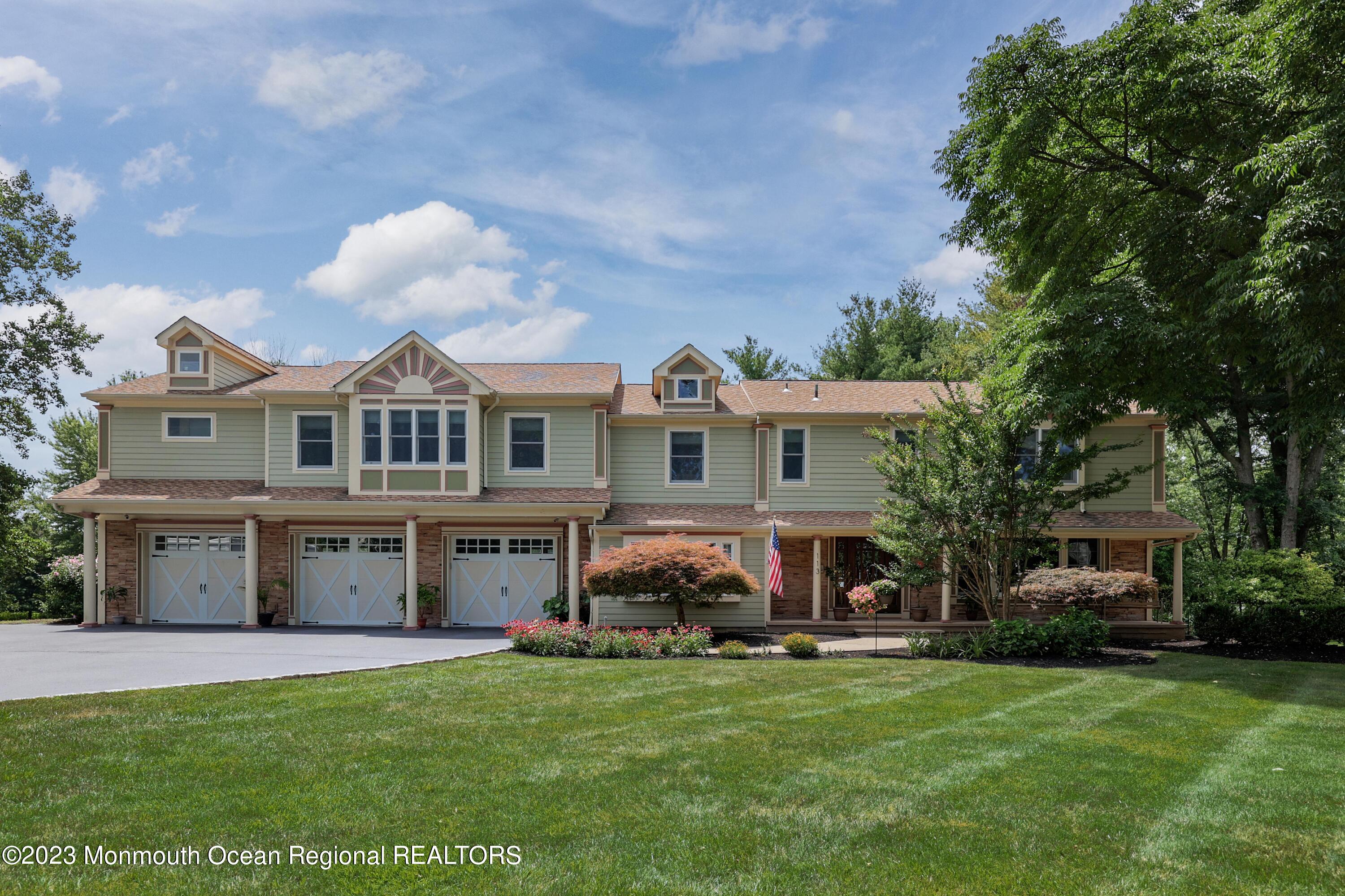 113 Ballantine Road Middletown, NJ 07748 - Photo 1 of 15 a view of a house with a back yard