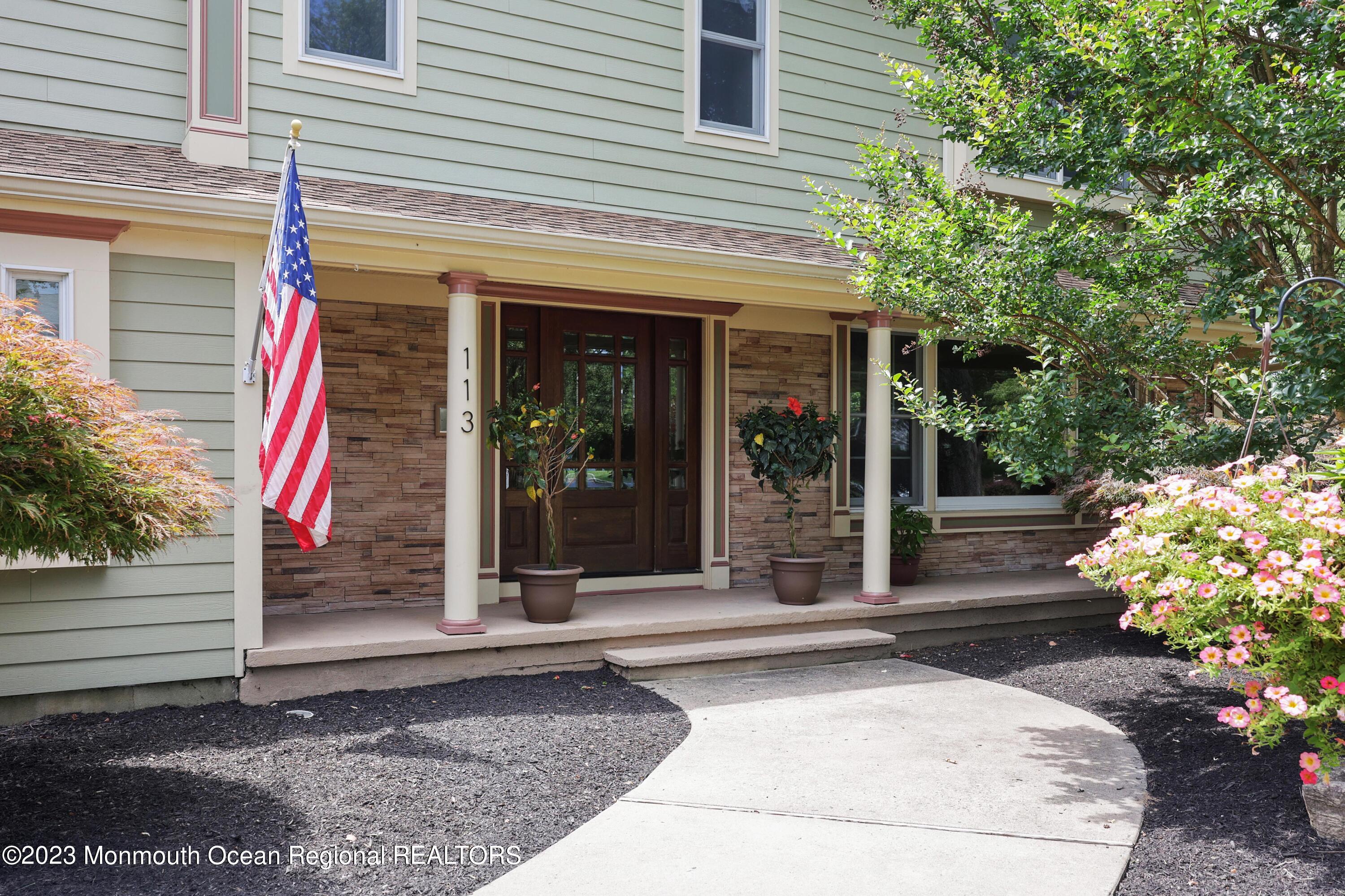 113 Ballantine Road Middletown, NJ 07748 - Photo 2 of 15 a view of a entrance door of the house