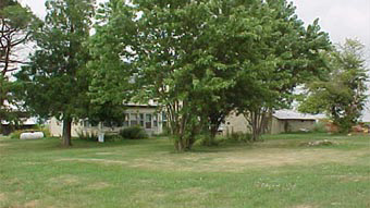 5857 North Cedar Road Mount Morris, IL 61054 - Photo 2 of 6 a view of a house with a yard