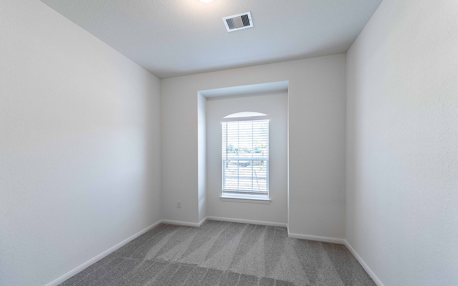 426 Monarch Trail Huntsville, TX 77340 - Photo 15 of 16 an empty room with a window
