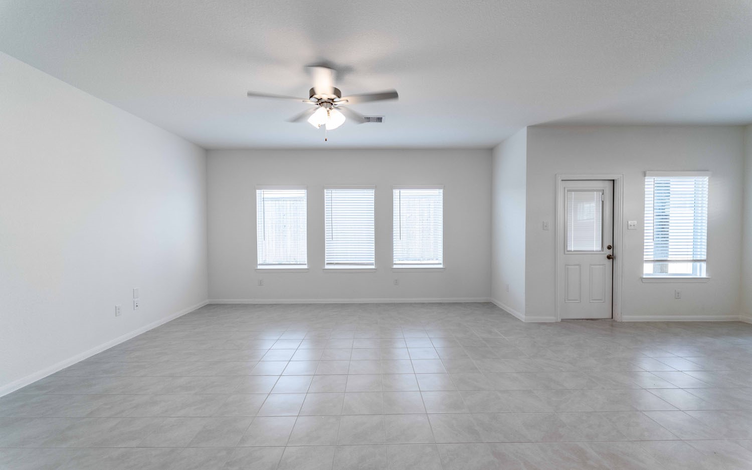 426 Monarch Trail Huntsville, TX 77340 - Photo 8 of 16 a view of an empty room with a window