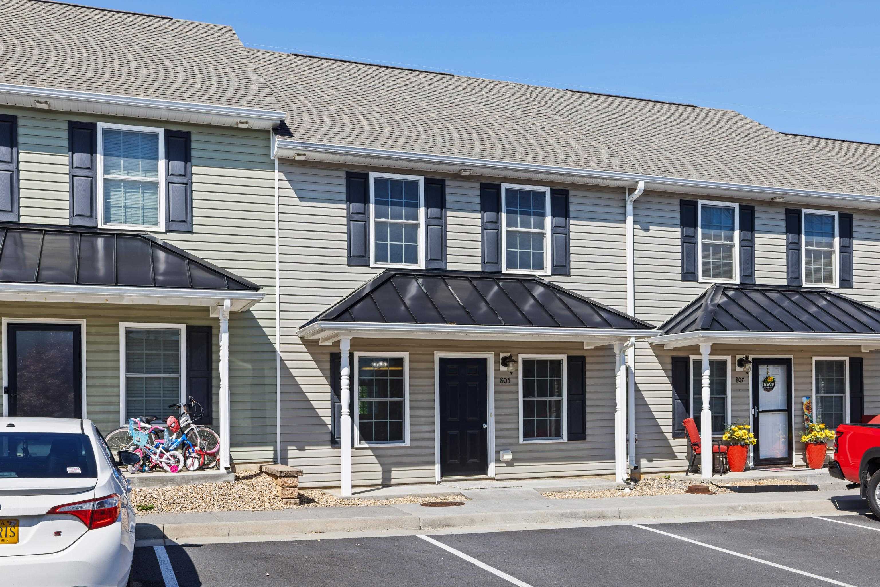 a view of a brick building with many windows