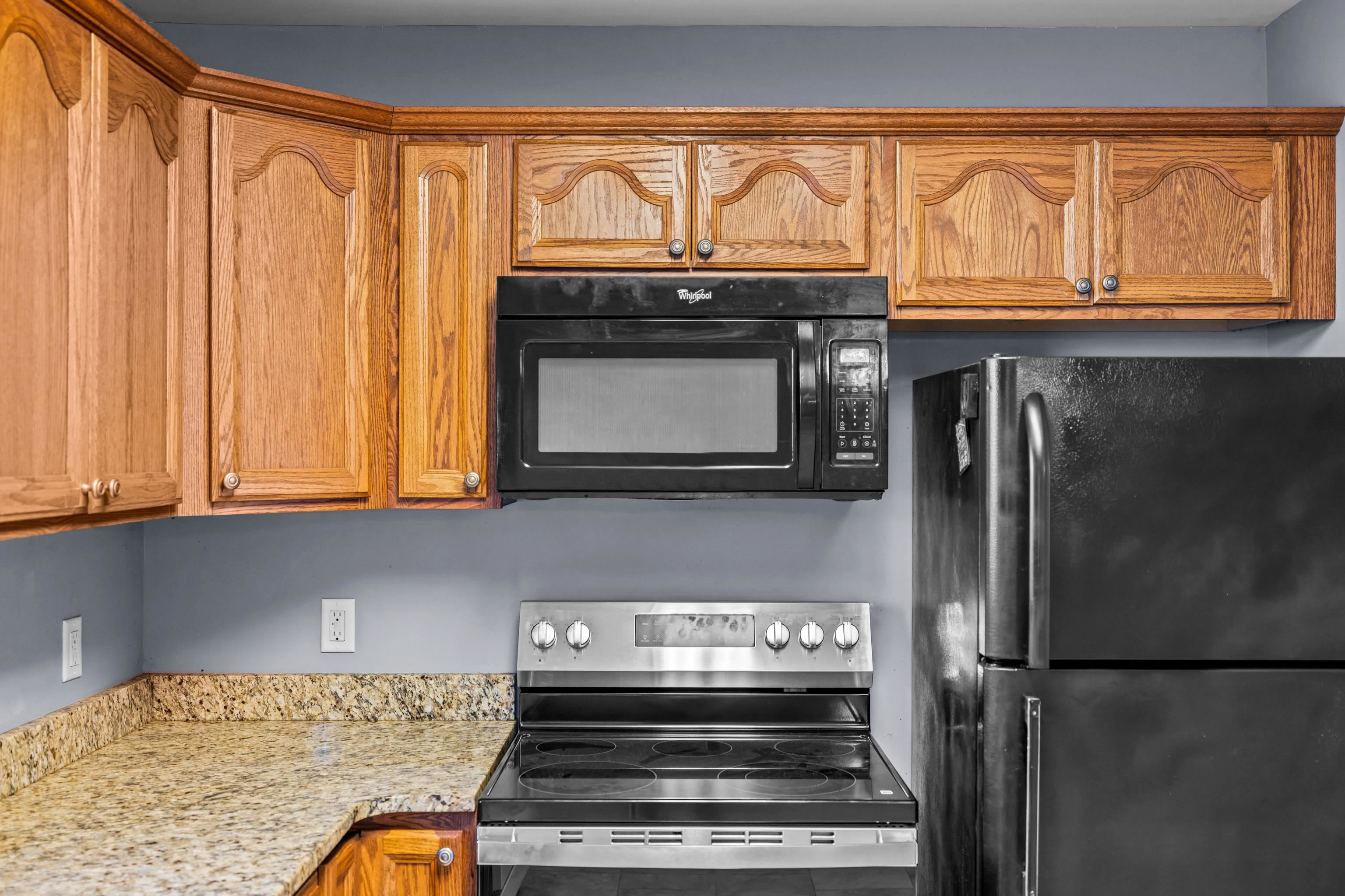 805 Carson Circle Grottoes, VA 24441 - Photo 13 of 40 a stove top oven sitting inside of a kitchen