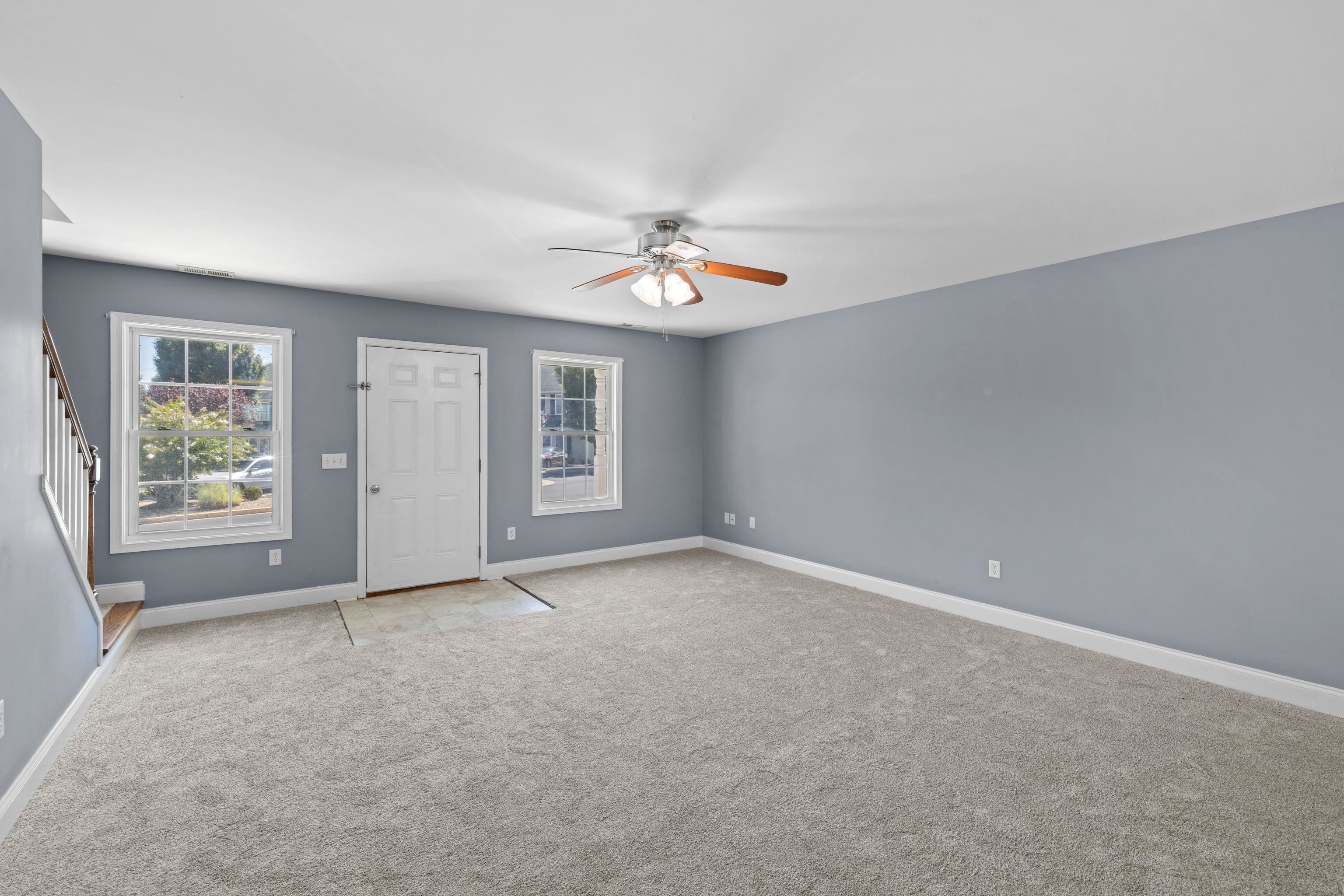 805 Carson Circle Grottoes, VA 24441 - Photo 17 of 40 an empty room with windows and fan