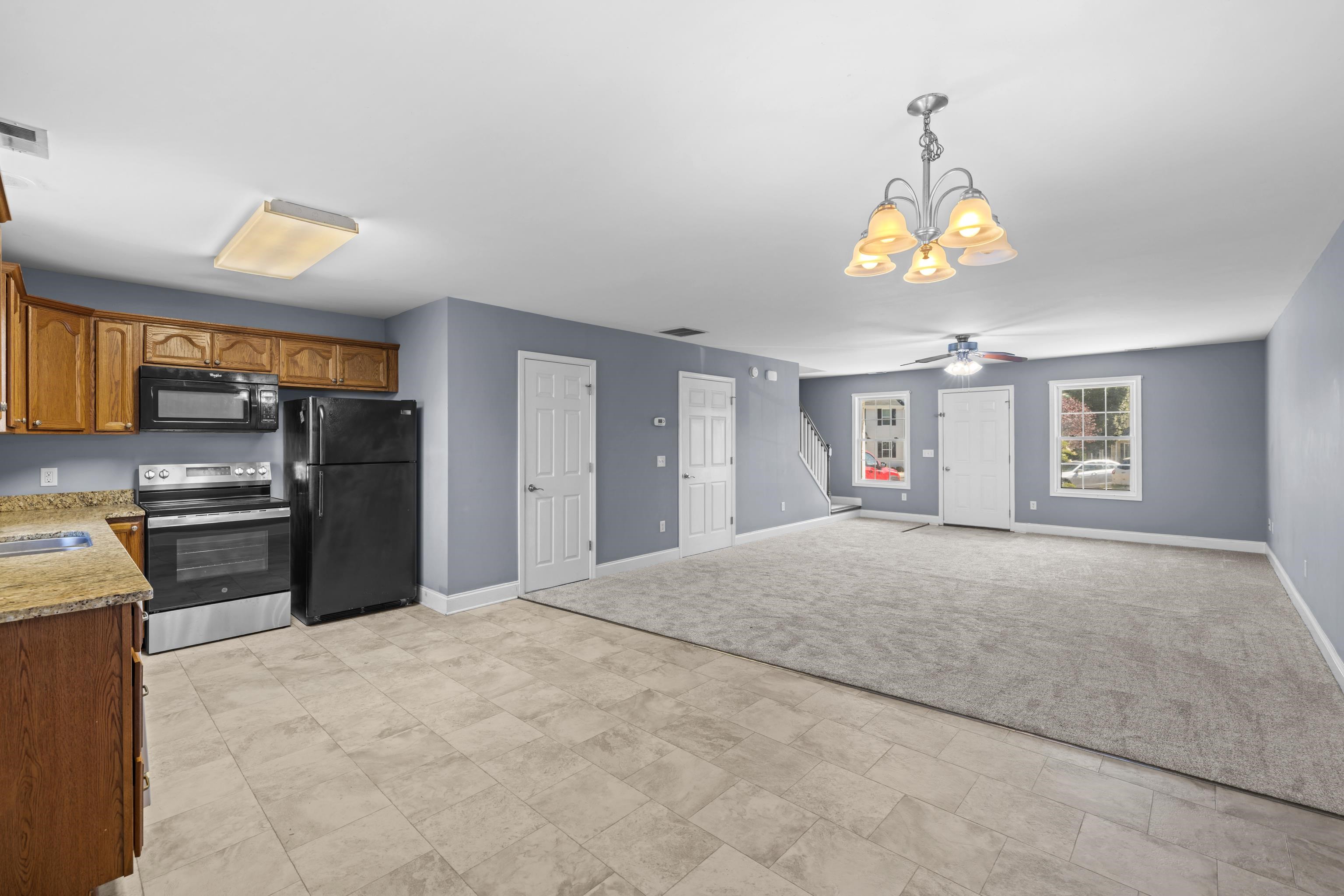 805 Carson Circle Grottoes, VA 24441 - Photo 18 of 40 a view of a kitchen with a sink stove and refrigerator