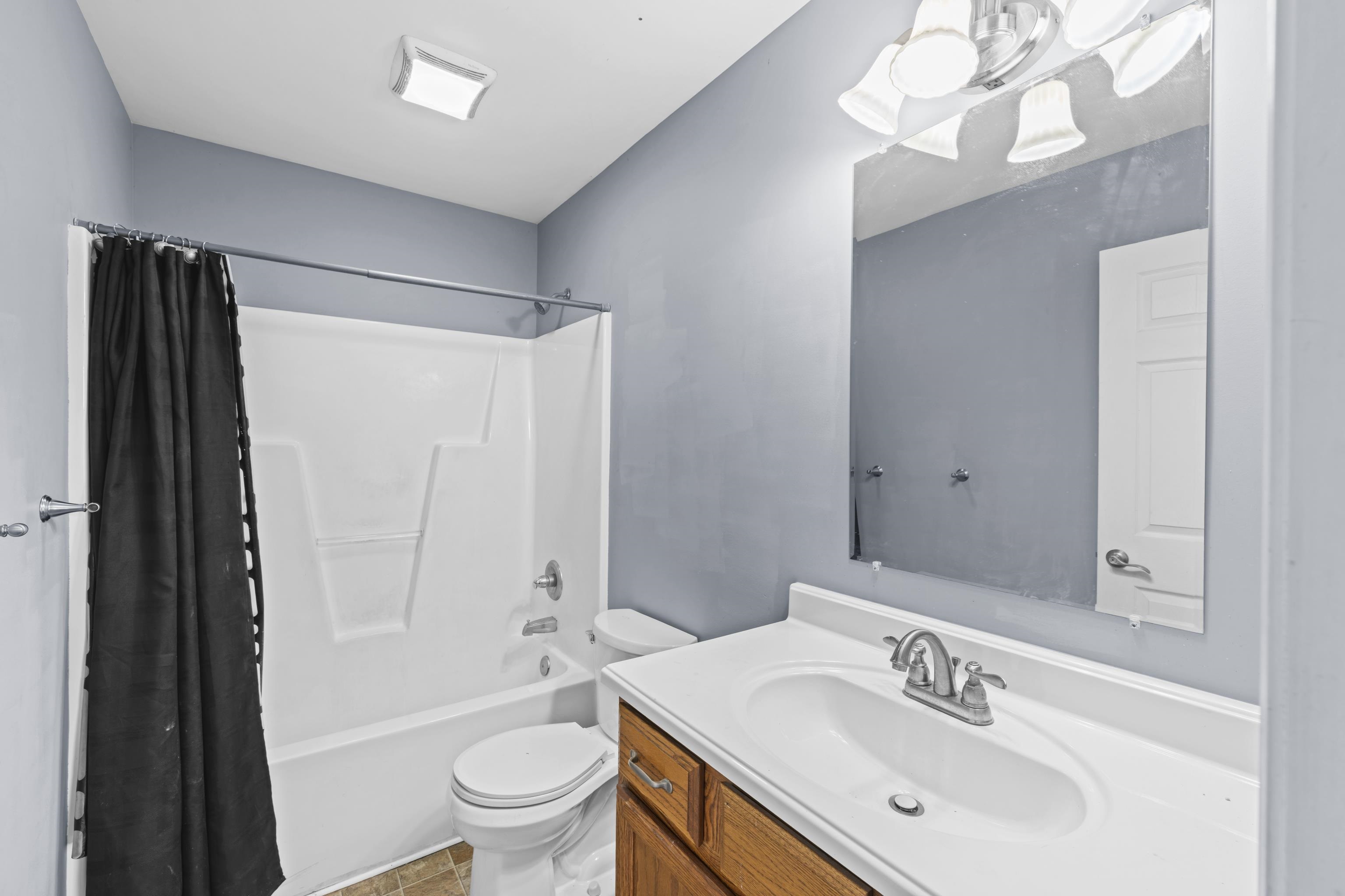 805 Carson Circle Grottoes, VA 24441 - Photo 26 of 40 a bathroom with a sink a toilet and shower