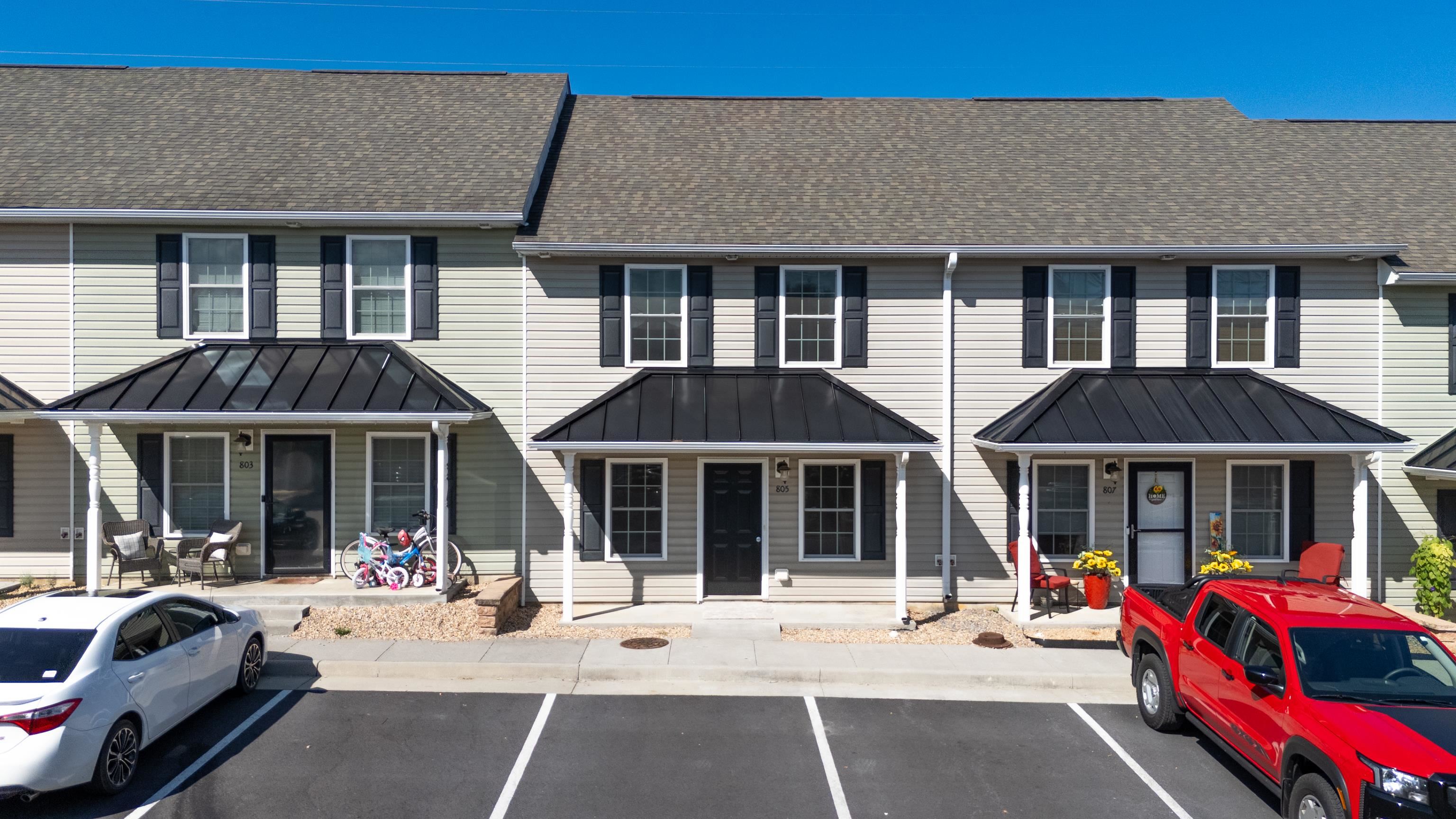 805 Carson Circle Grottoes, VA 24441 - Photo 38 of 40 a view of a house with a patio and a yard