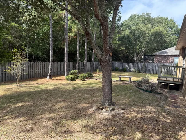 a view of a patio with a yard