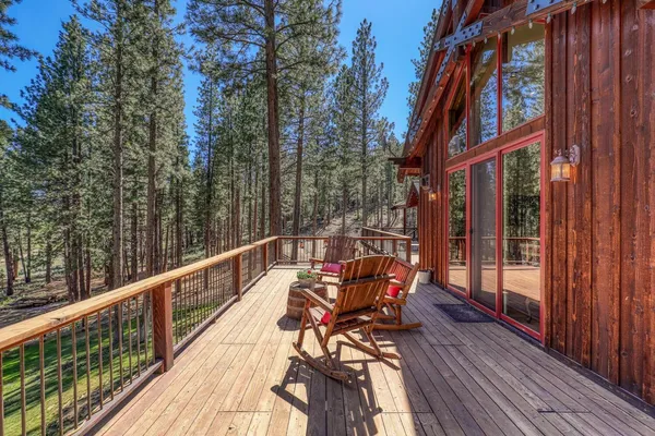 a view of a balcony with chairs