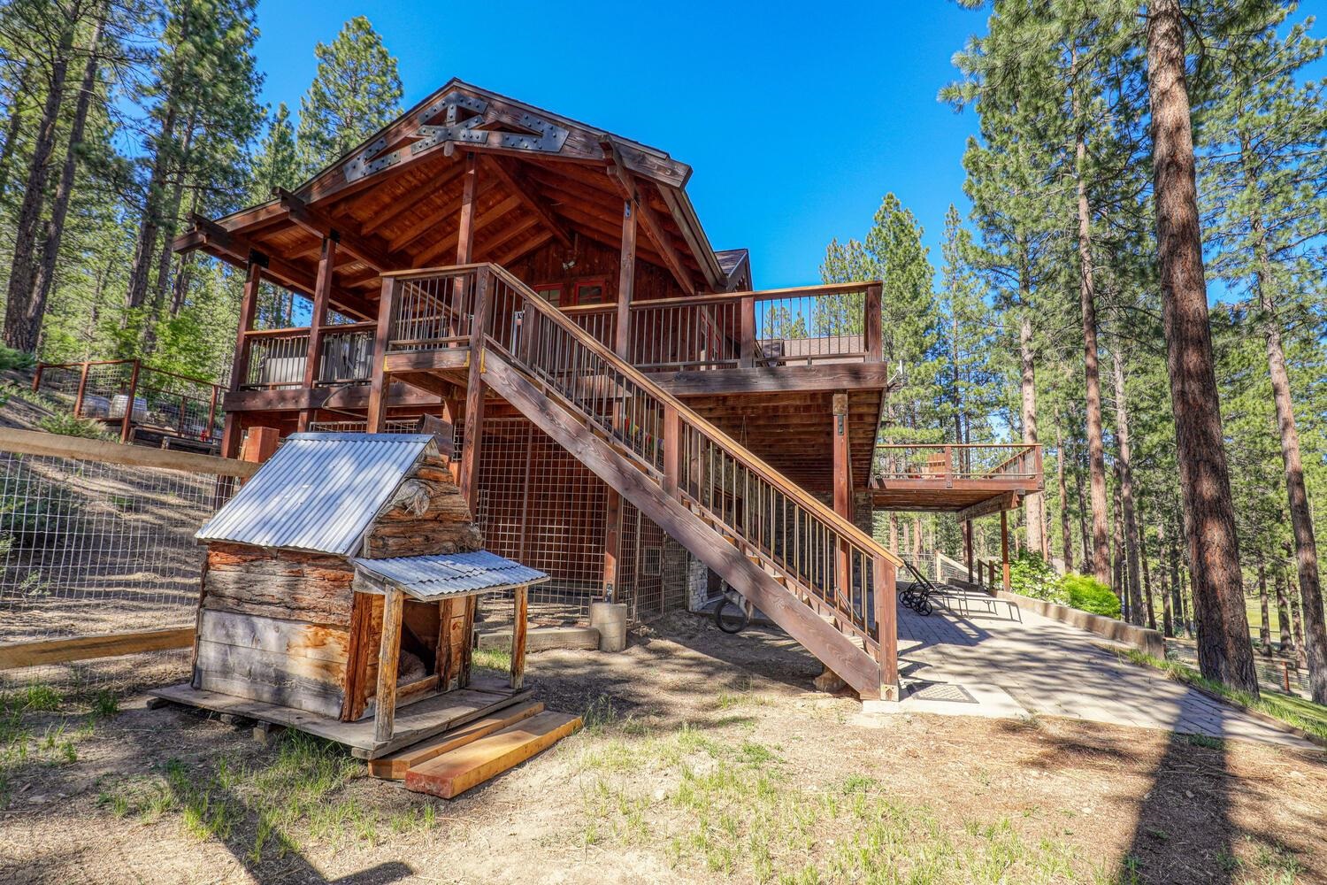 16356 Greenlee Truckee, CA 96161 - Photo 21 of 28 a view of a house with wooden stairs and a yard