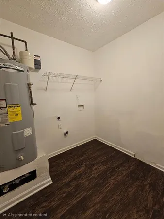 an empty room with wooden floor and cabinet