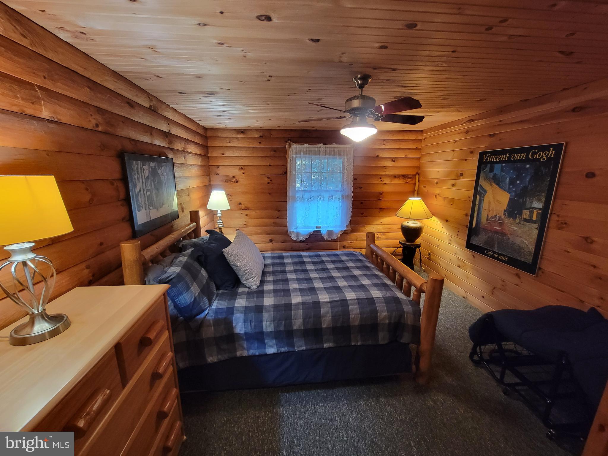 678 Walker School Road Townsend, DE 19734 - Photo 23 of 32 a bedroom with bed and wooden floor