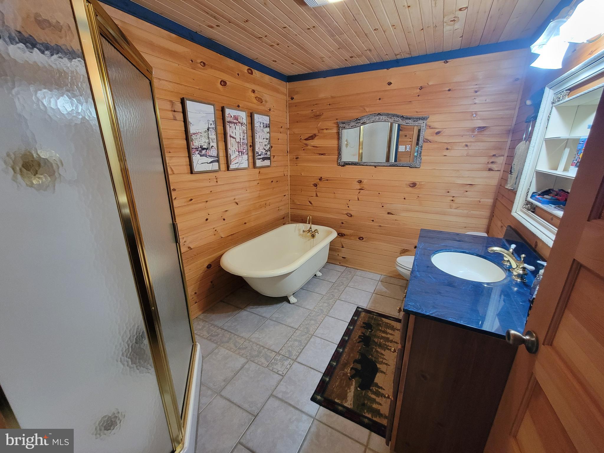 678 Walker School Road Townsend, DE 19734 - Photo 26 of 32 a bathroom with a sink and a mirror