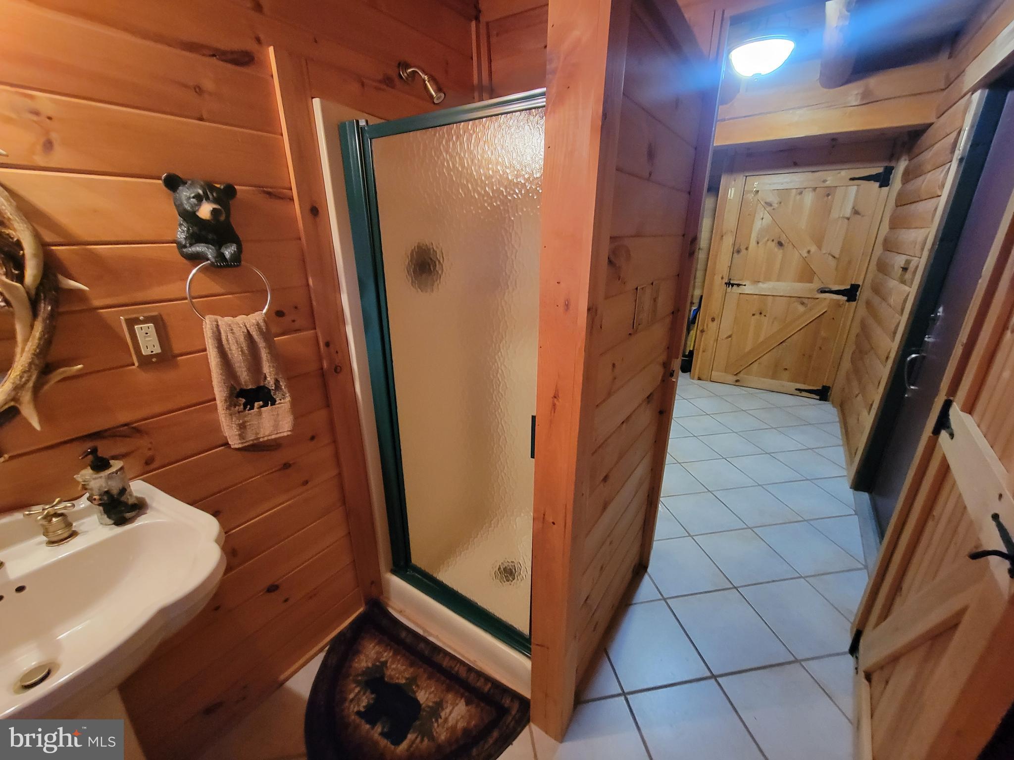 678 Walker School Road Townsend, DE 19734 - Photo 27 of 32 a bathroom with a sink and mirror