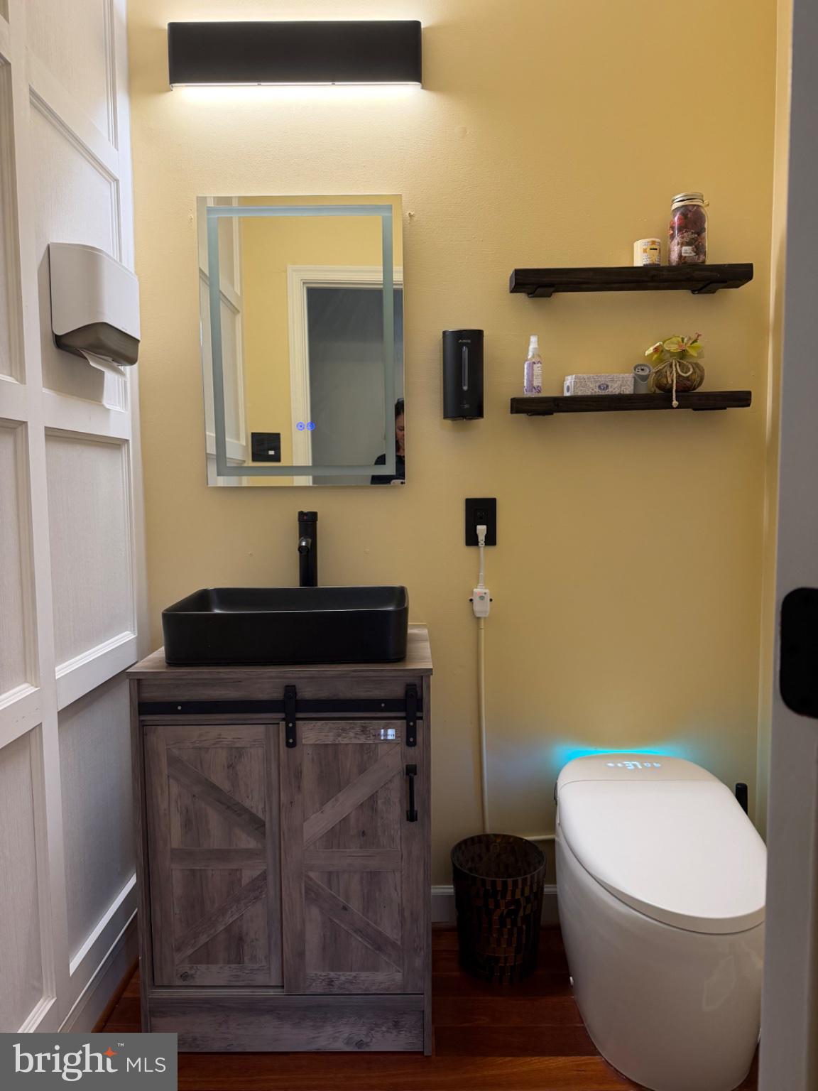 2502 Short Putt Court Crofton, MD 21114 - Photo 5 of 35 Sleek modern bathroom with rustic charm.