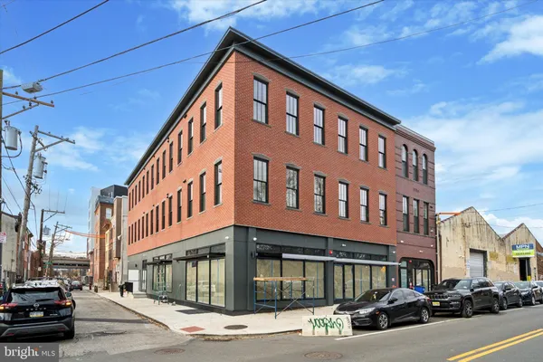 a front view of a building with street view