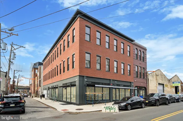 a front view of a building with street view