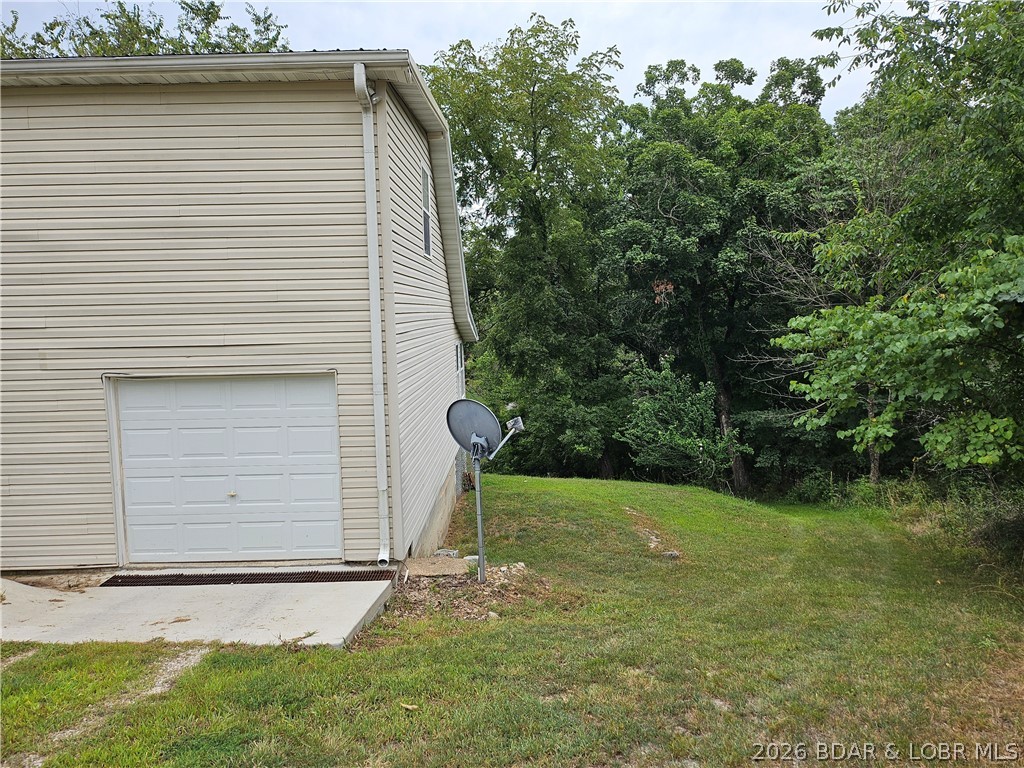22 Launch Landing Edwards, MO 65326 - Photo 6 of 68 1-car garage attached to the house. Entry from ga