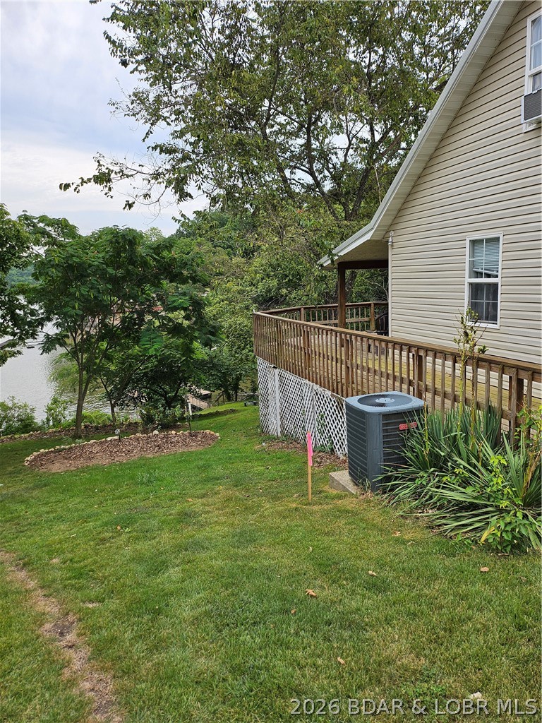 22 Launch Landing Edwards, MO 65326 - Photo 8 of 68 Side view of deck which wraps around the lakeside