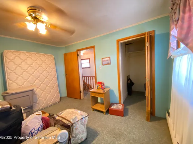 a view of a couch in the front of a building