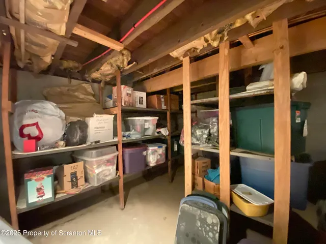 a garage with table and chairs