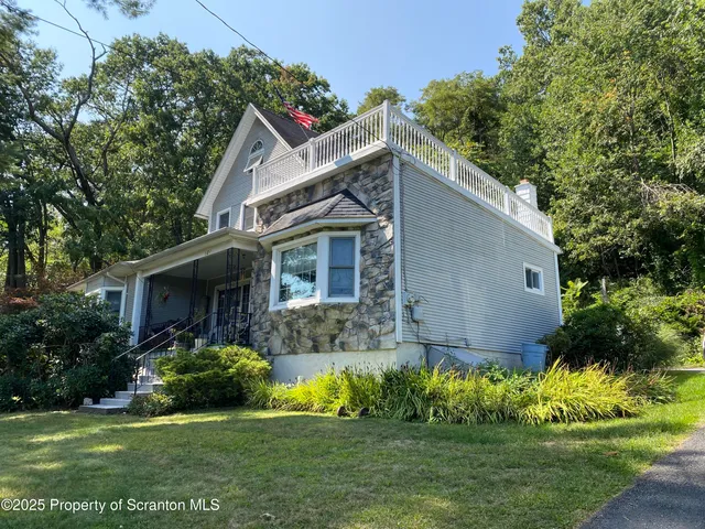 a view of a back yard of the house