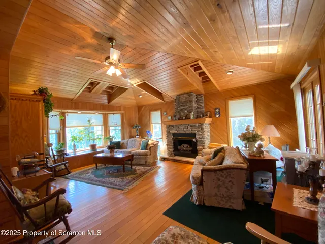 a view of a living room and a potted plant