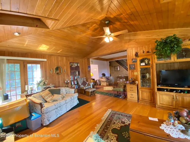a fireplace with a clock on wall