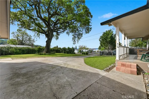 a view of a house with a big yard