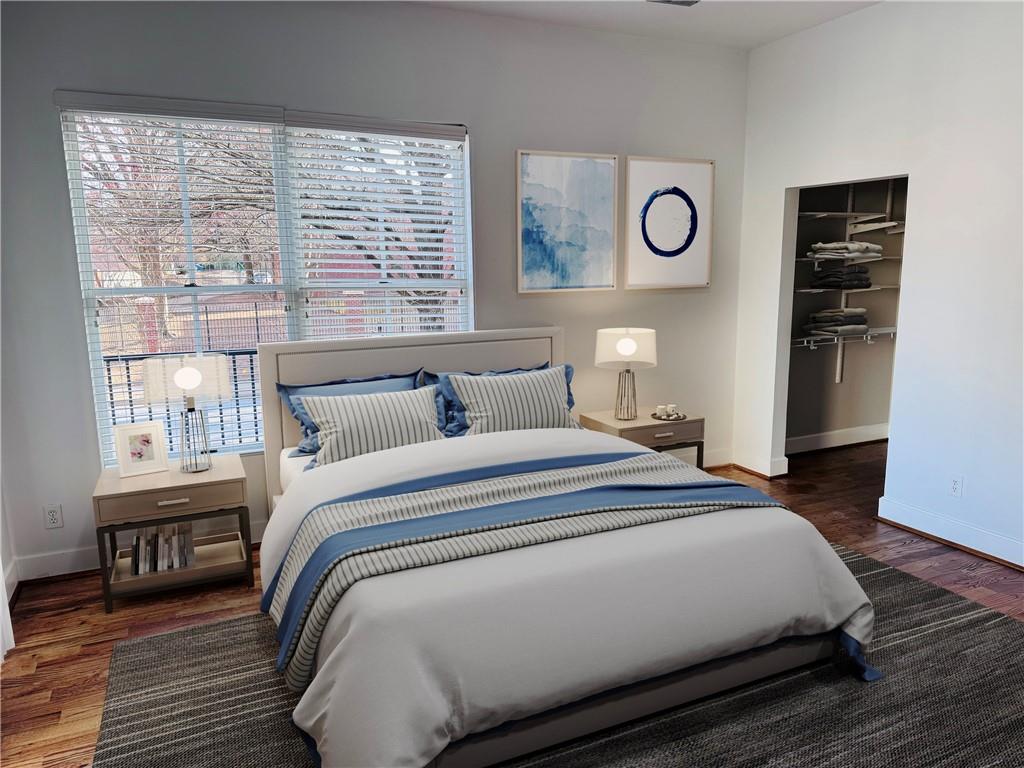 384 Ralph McGill Boulevard Northeast, Unit 121 Atlanta, GA 30312 - Photo 6 of 38 a bedroom with bed and a window