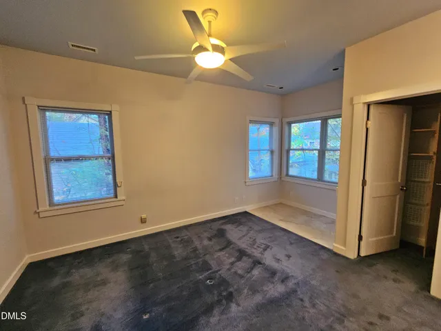 a bathroom with a tub and a shower