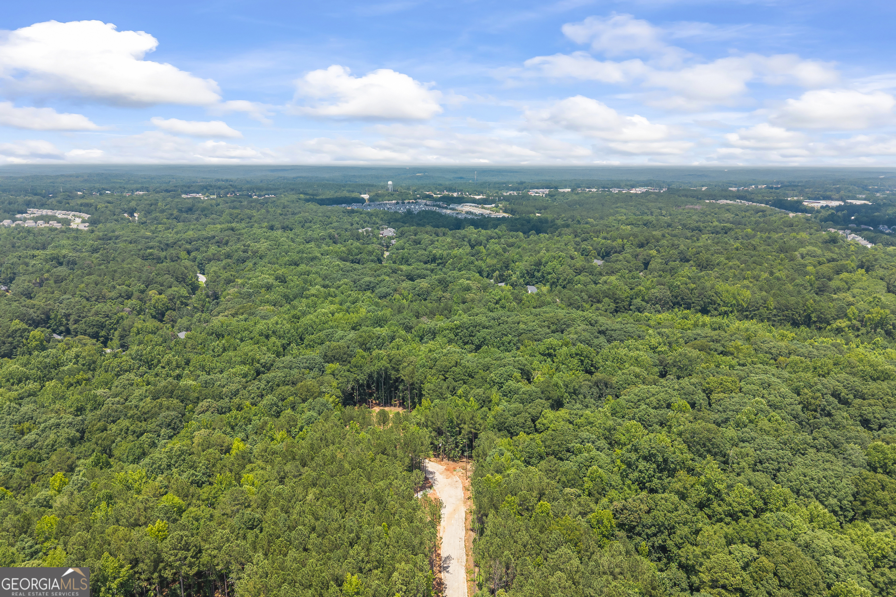 0 Tall Oaks Road Watkinsville, GA 30677 - Photo 6 of 12 a backyard of a building with lots of green space