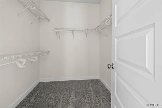 a view of a hallway with windows