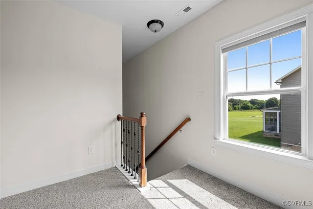 an aerial view of a house with swimming pool garden and outdoor seating