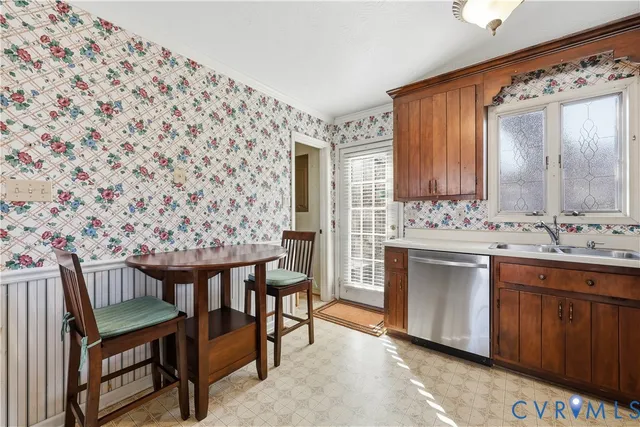 a spacious bathroom with a sink and a mirror