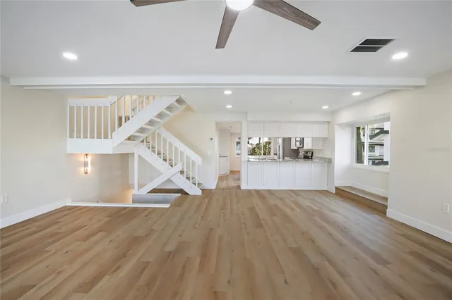 a view of kitchen with sink and cabinet area