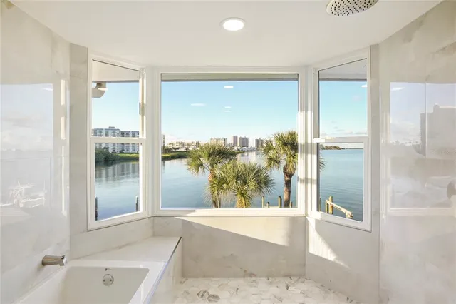 a bathroom with a bathtub and a sink