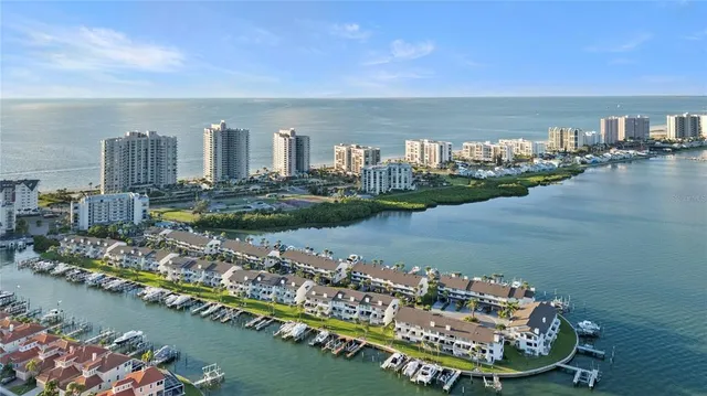 a view of a city with an ocean