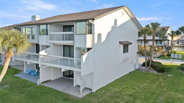 a view of a backyard of the house
