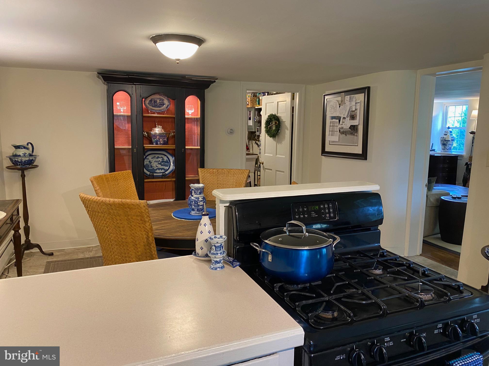776 W Road West Grove, PA 19390 - Photo 11 of 26 a kitchen with stainless steel appliances granite countertop a stove and a wooden floors