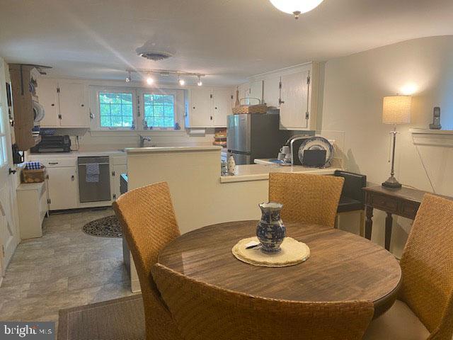 776 W Road West Grove, PA 19390 - Photo 12 of 26 a kitchen with a dining table and chairs