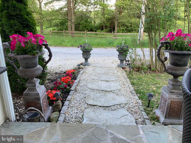 776 W Road West Grove, PA 19390 - Photo 2 of 26 a view of a wooden bench sitting in front of a house