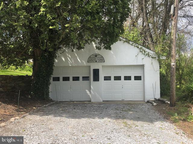 776 W Road West Grove, PA 19390 - Photo 22 of 26 a front view of house with a garden